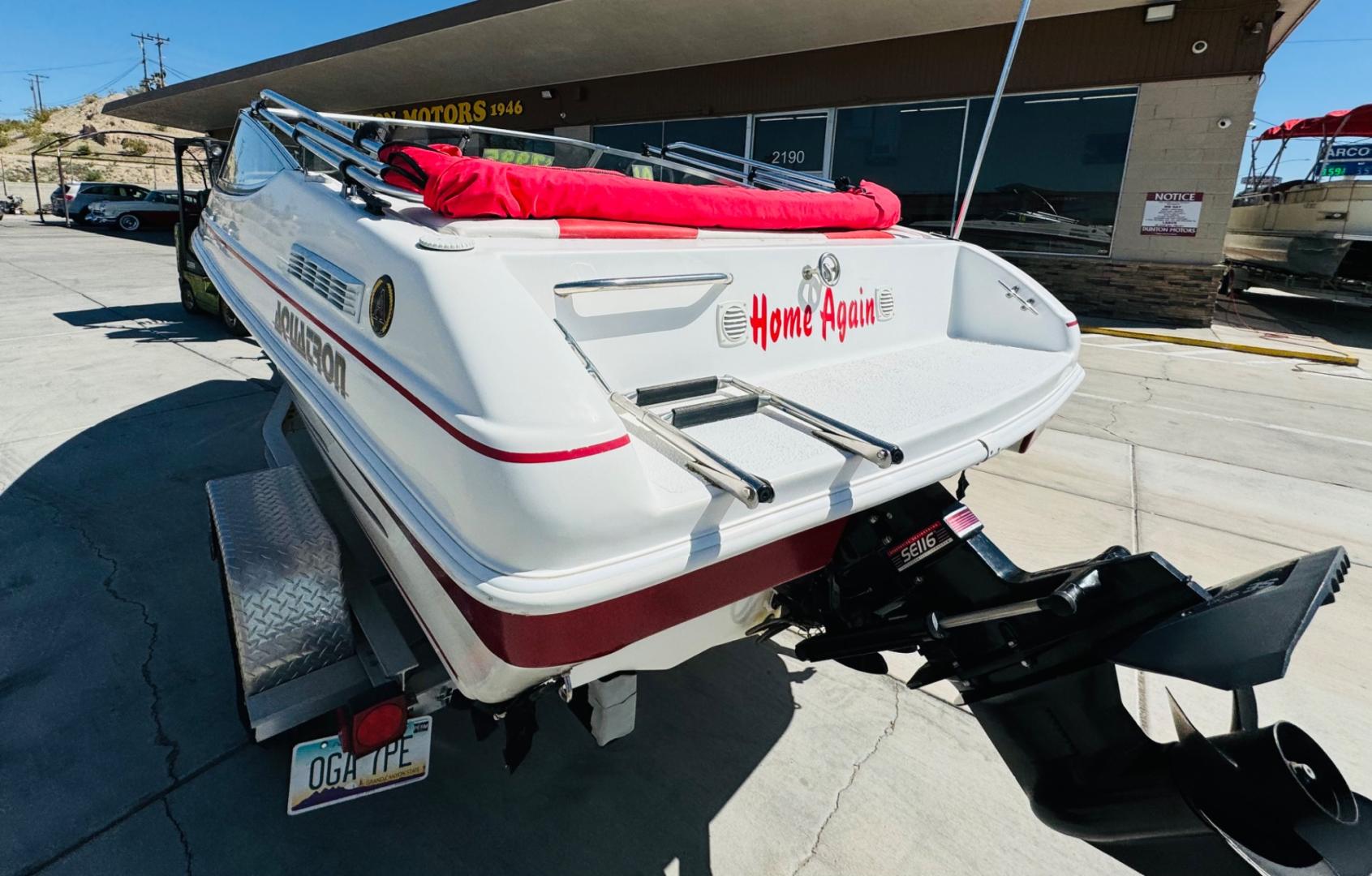 2001 White /white/red Aquatron 180 , located at 2190 Hwy 95, Bullhead City, AZ, 86442, (928) 704-0060, 0.000000, 0.000000 - On consignment this 2001 Aquatron 180. 3.0 engine. 18ft in length. nice bimini top . interior has some damage. price reduced. Runs great. - Photo#6